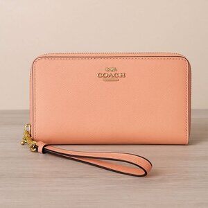 Coach Peach Leather Wristlet Wallet With Gold Hardware Zip Around Closure